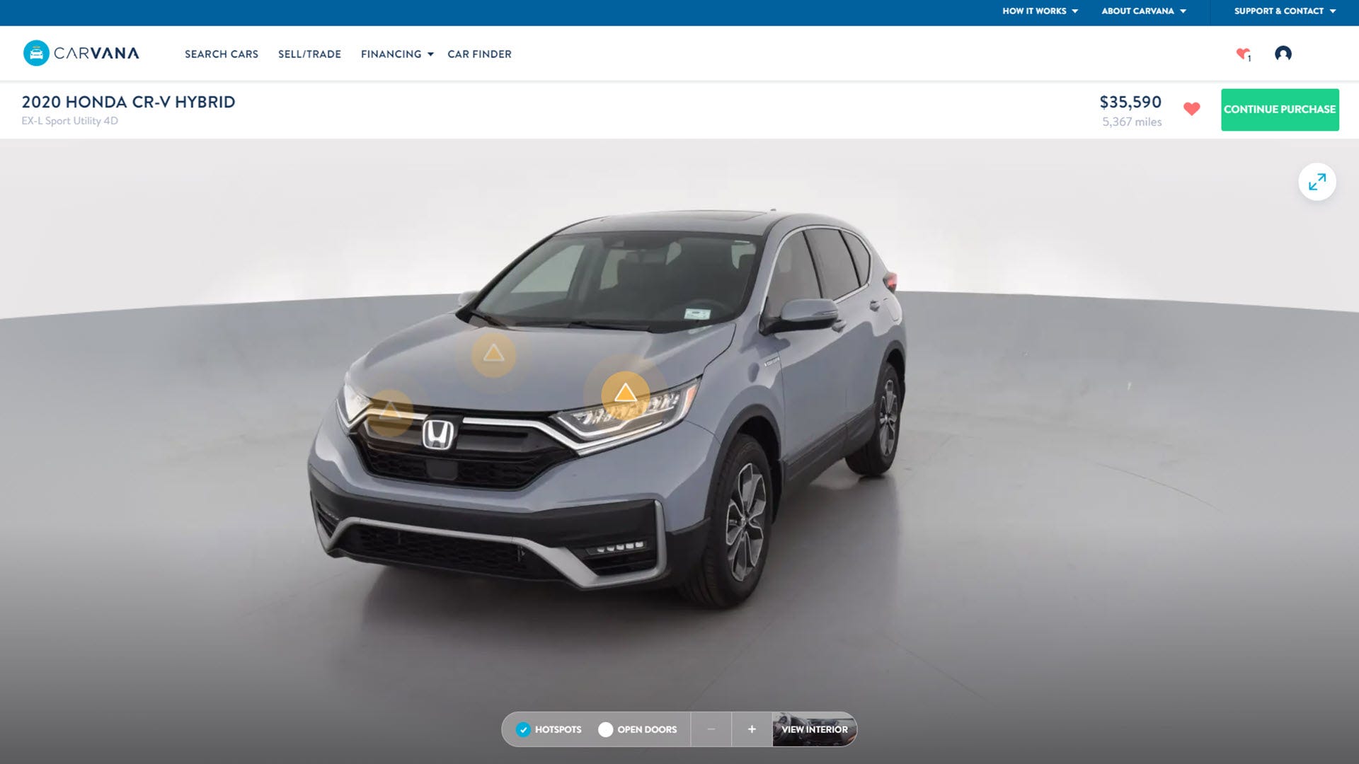 the Carvana website, featuring a CR-V Hybrid with several yellow symbols